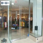 სავაჭრო ცენტრის შესასვლელის ჰიდრავლიკური მინის კარი - მაღალი ტრაფიკისთვის